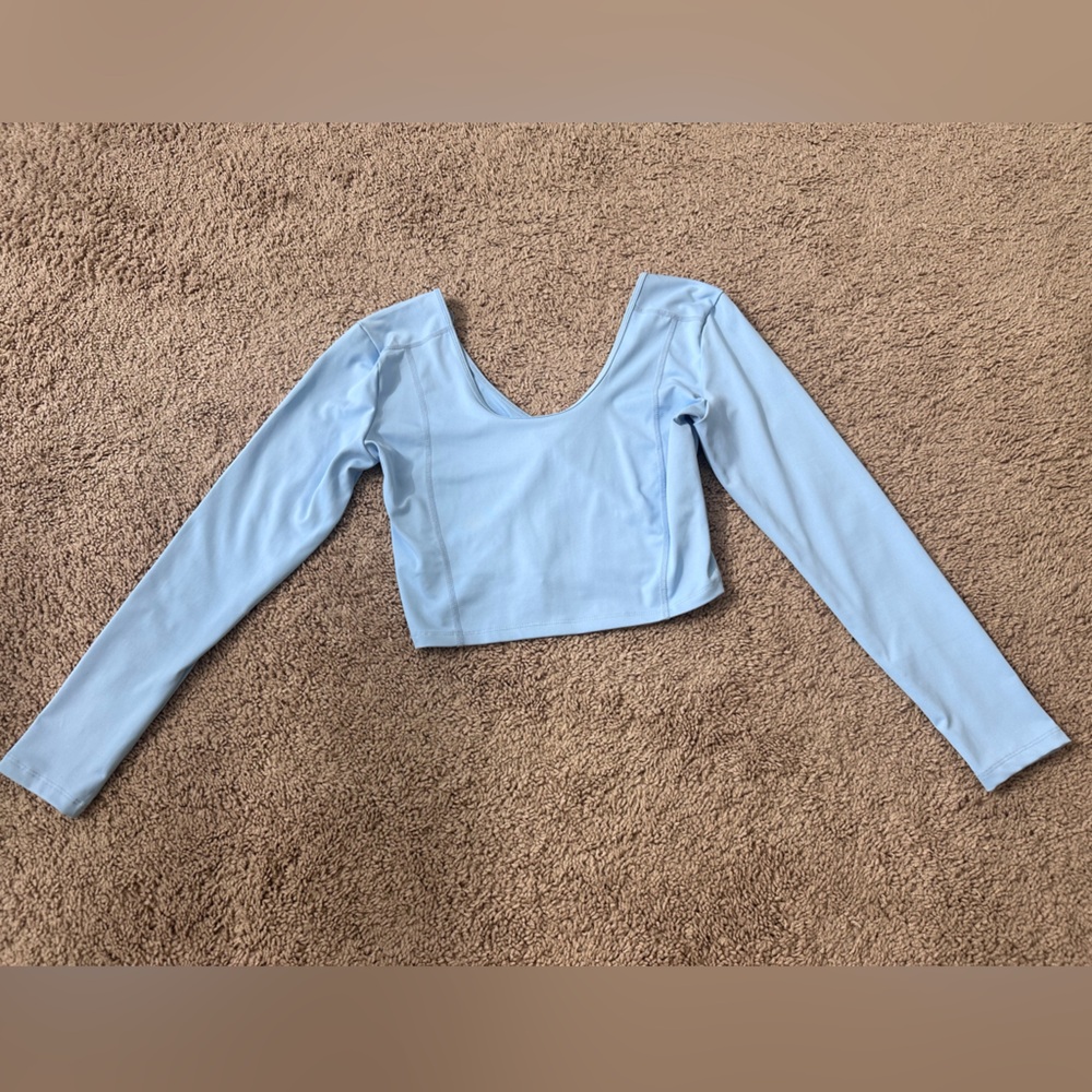 Athletic tops from Amazon in pink and light blue